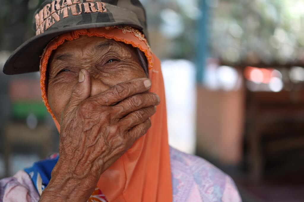 Old woman laughing