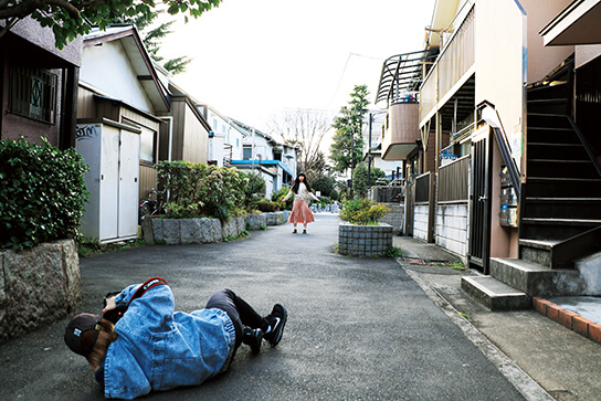 Behind-the-scenes shot showing photographer taking the shot