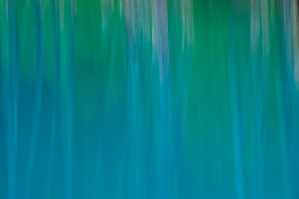 Abstract image of Blue Pond in Hokkaido shot with a slow shutter