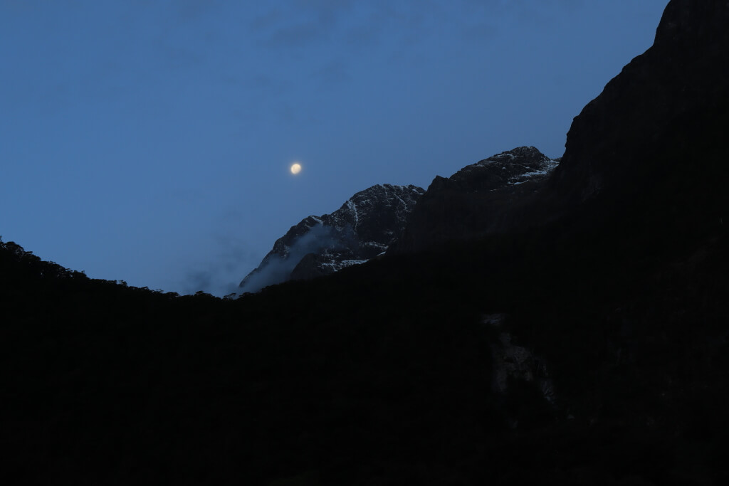 Moon and mountains during Blue Hour