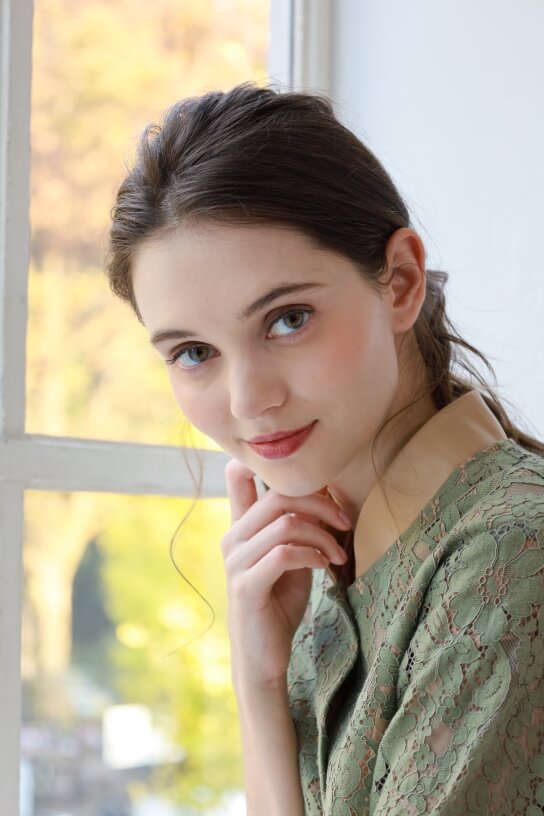 Portrait of lady by window