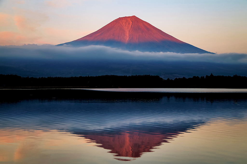 Red Mount Fuji with reflection in lake
