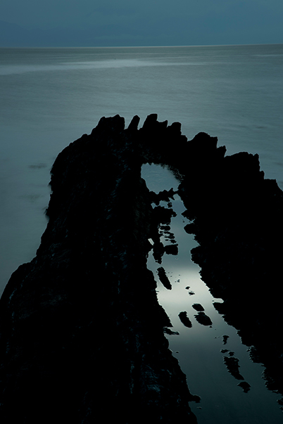 Vertical orientation of rocks in sea