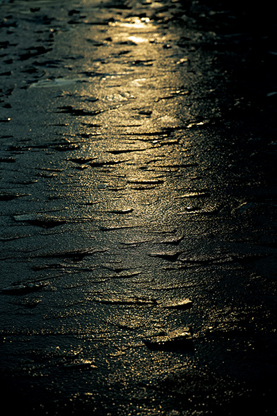 Ice sheets in sea with light beam