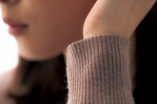 Close up of wrist with model’s jawline in background