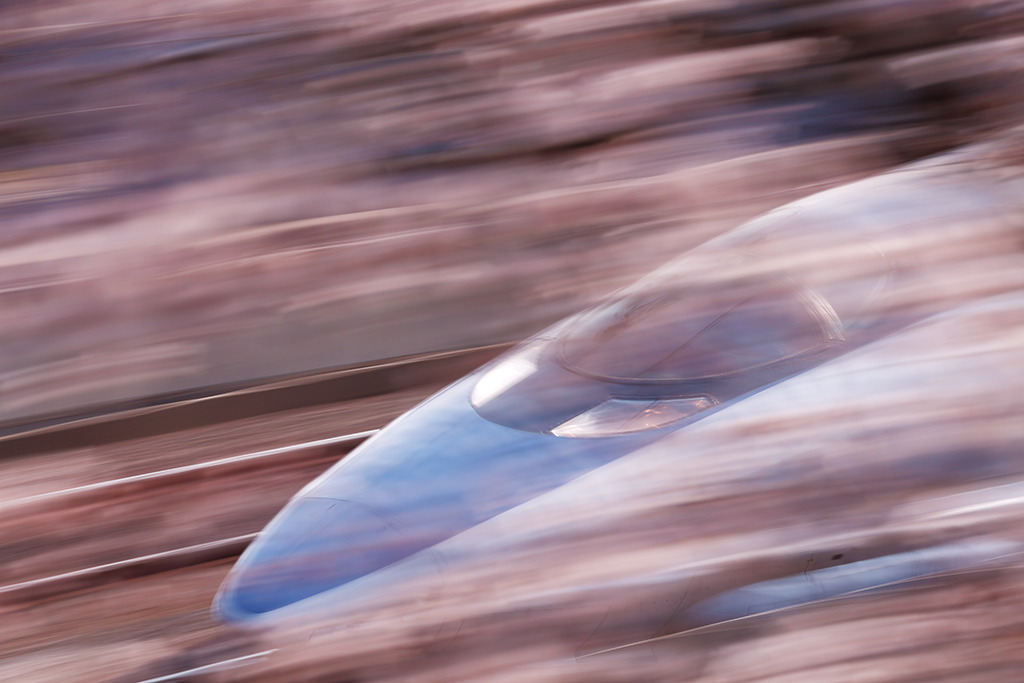 Bullet train with panned foreground bokeh