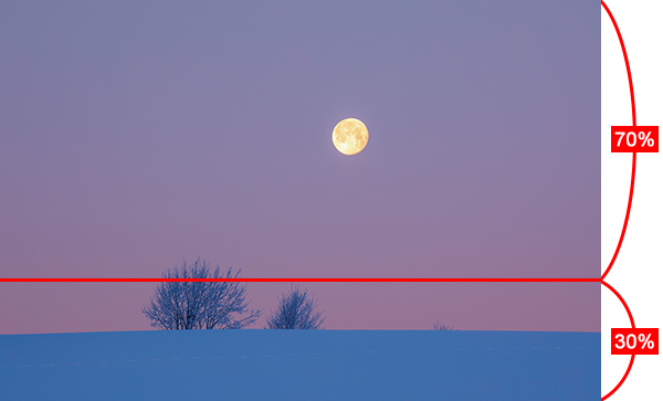 Pink and purple sky with moon