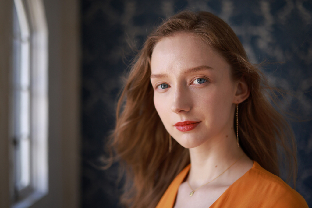 Head shot of lady by window