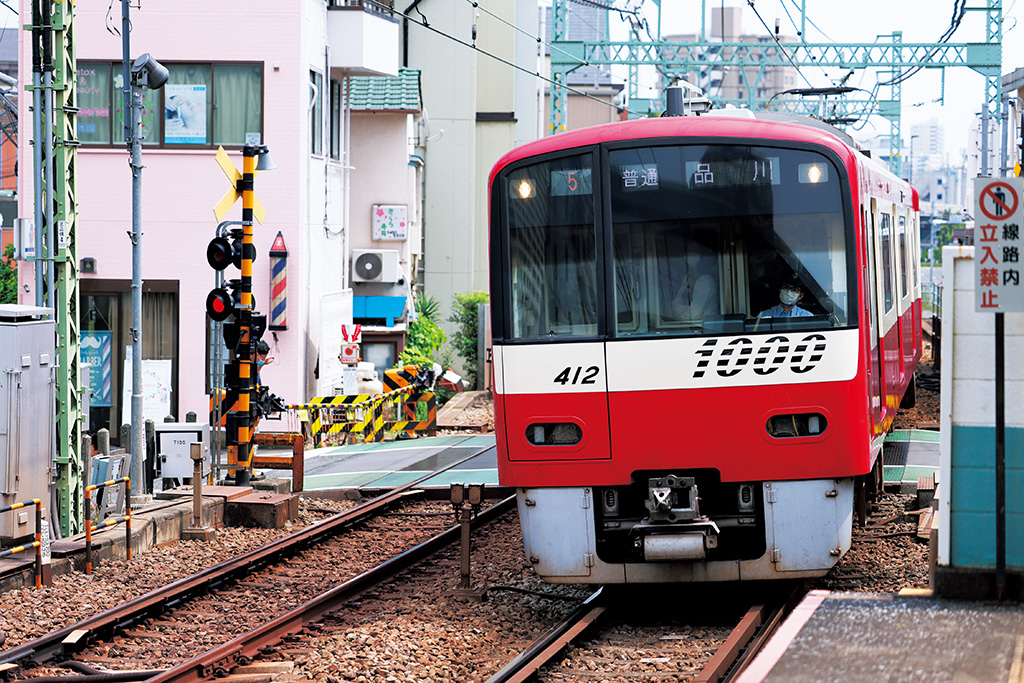 Train at urban railroad crossing
