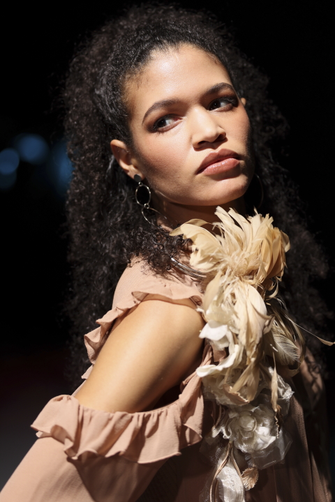 Vertical fashion portrait shot in low light