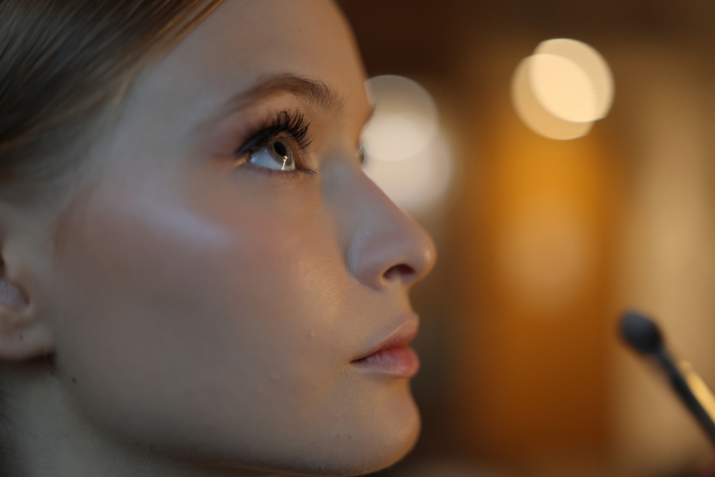 50mm f/1.4 beauty shot with bokeh lights in background