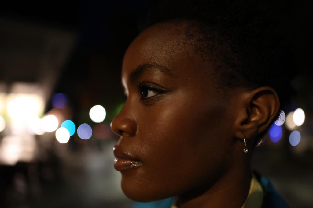 24mm close-up head shot at night with bokeh lights