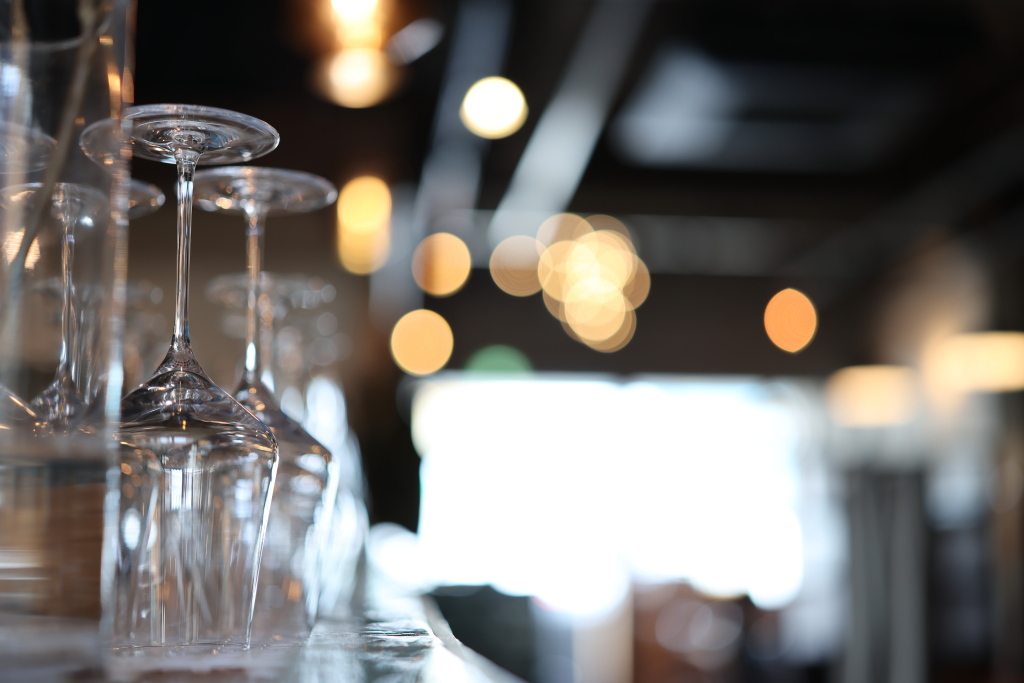 Glasses against bokeh background at night